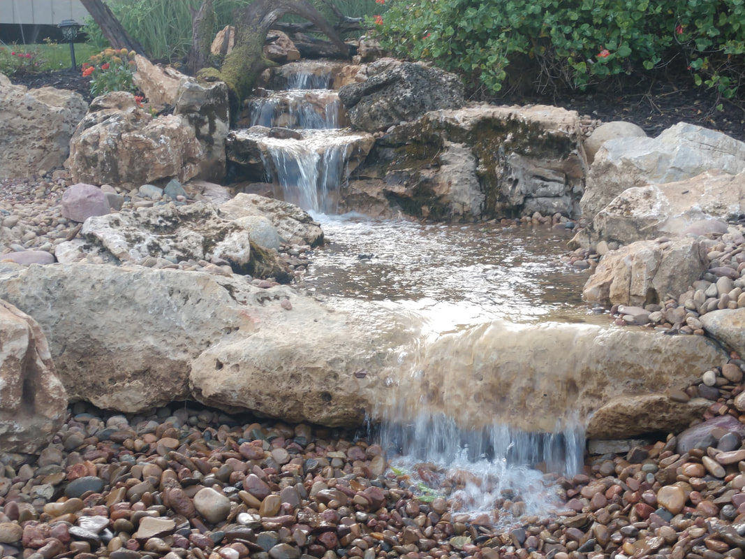 Disappearing Backyard Pondless Waterfall Contractors